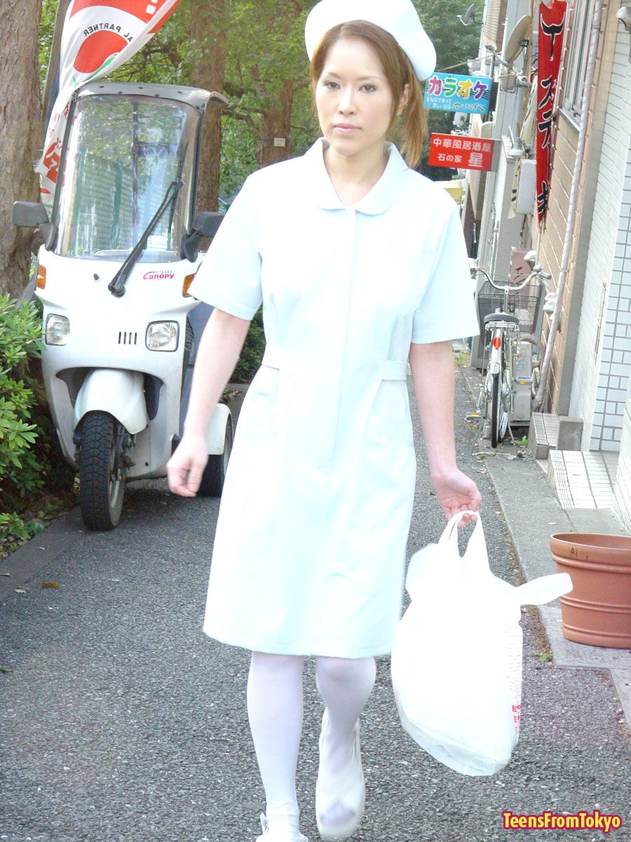 Japanese nurse toying pussy